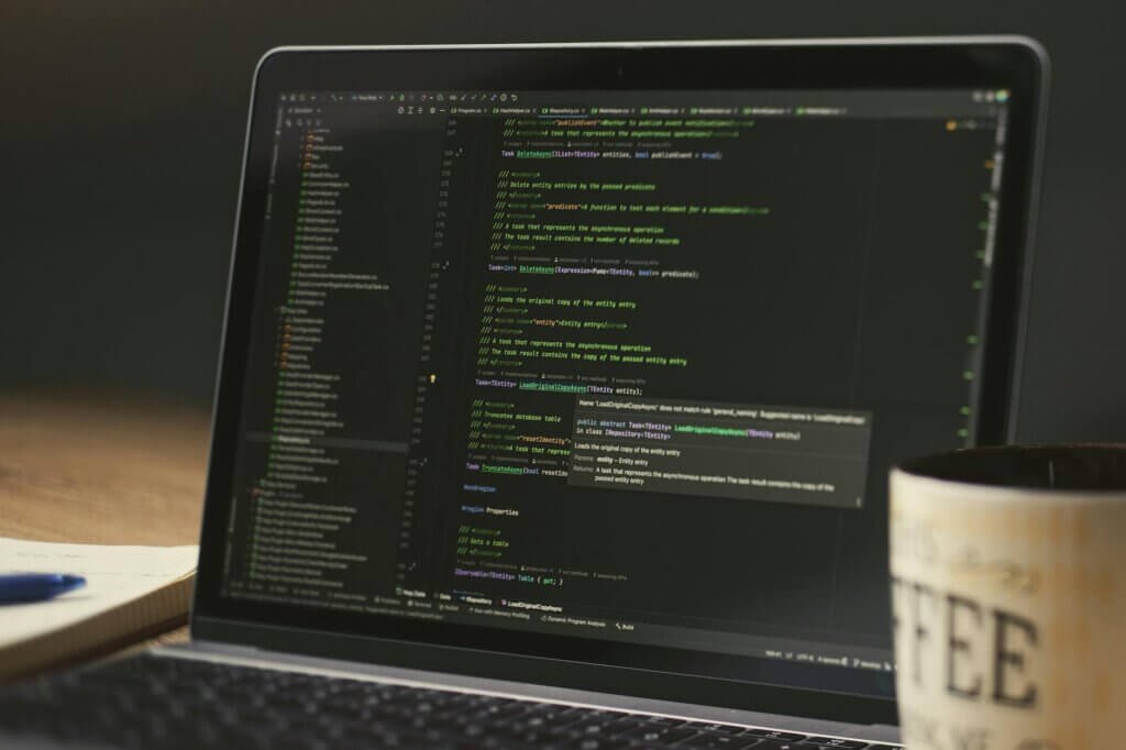 focused coding session with laptop and coffee
