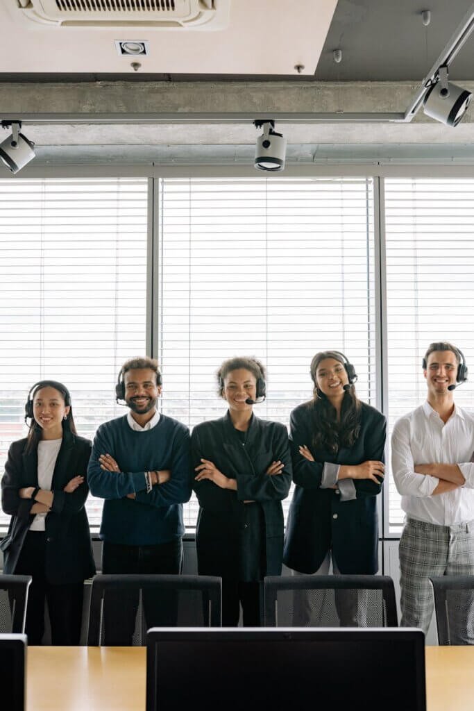 people wearing headsets in an office